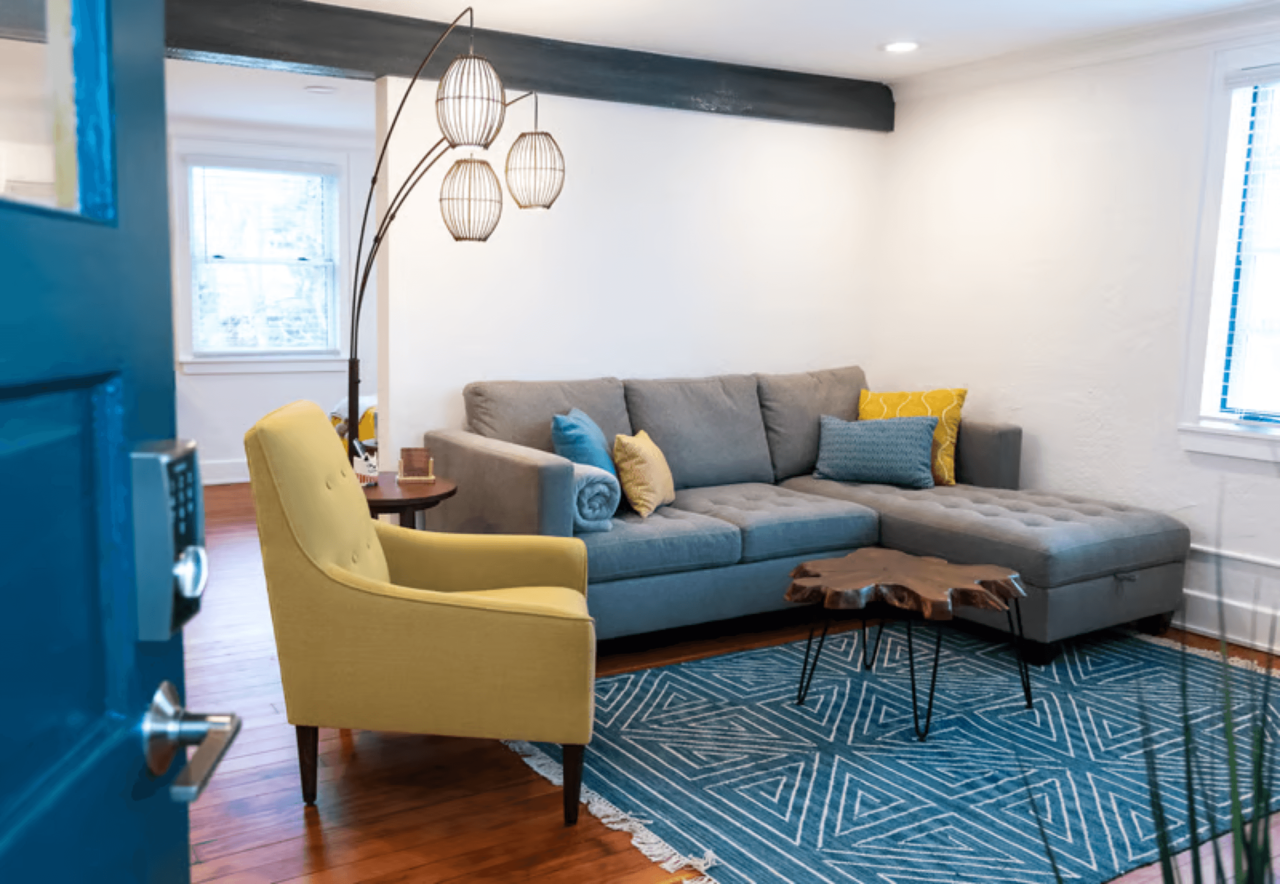 Cozy family living room with a gray sectional sofa, fresh and tidy